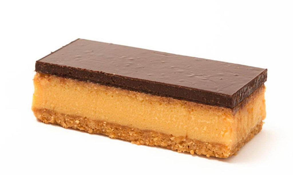 Caramel Slice with biscuit base and a fudgy caramel centre and dark chocolate on top in a box of 6
