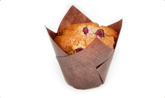 Raspberry Muffin flavoured with whole raspberries, and baked in a folded square of plain wax paper