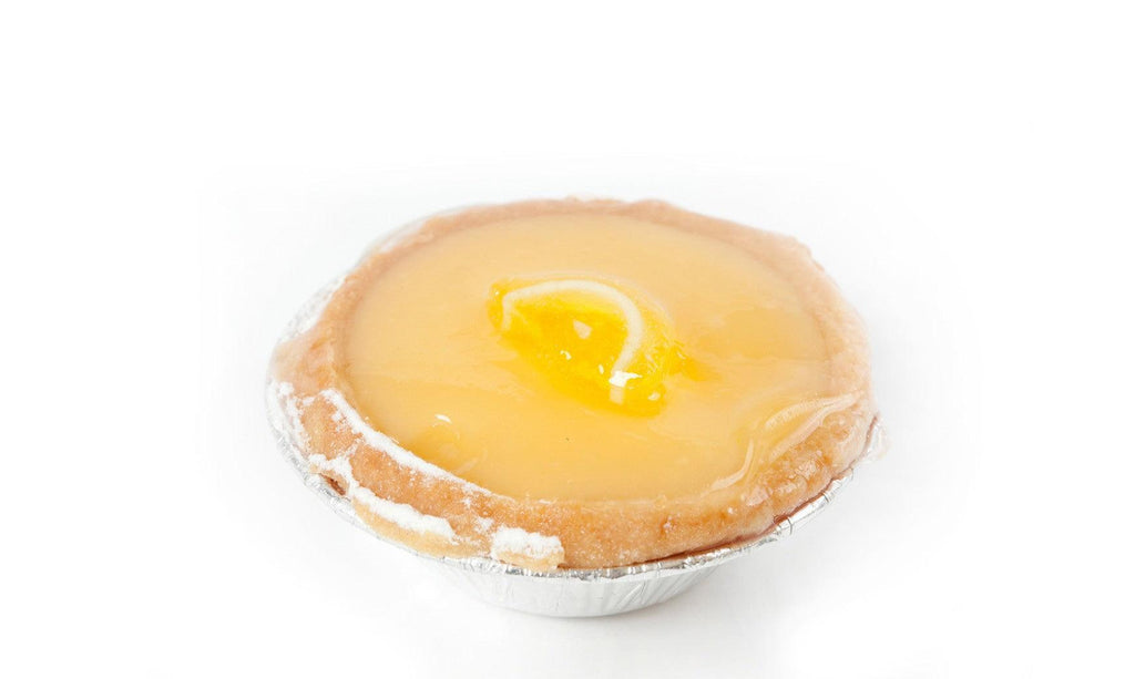 Cocktail Lemon Citron tart with tangy lemon curd in a shell of soft, buttery pastry.