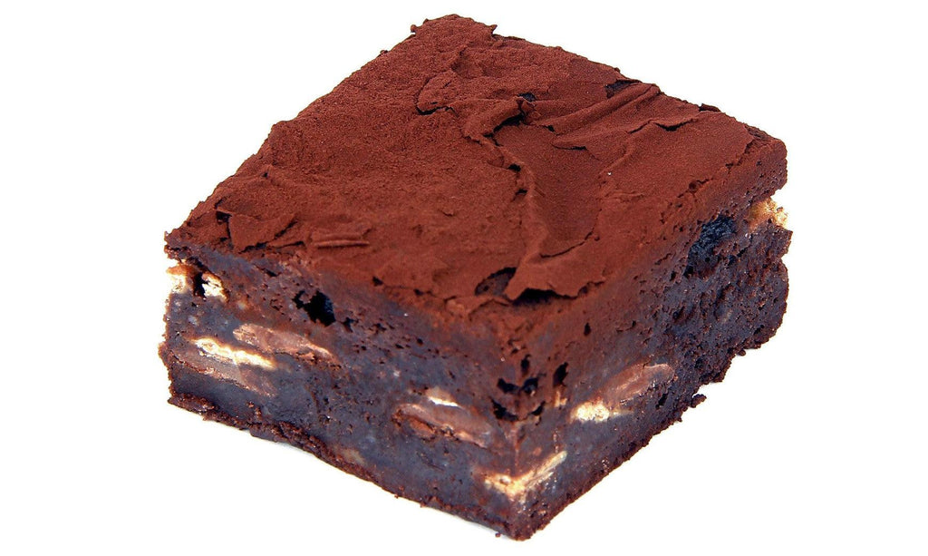 Chocolate Fudge Brownie Slice with Gluten free with a triple dose of milk, dark and white chocolate chunks, suspended in a rich chocolate fudge and dusted with cacoa in a box of 6