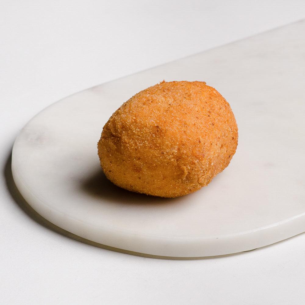 Pasticceria crunchy golden Brown risotto ball (Arancini) filled with flavoursome chicken, bacon and cream for extra flavour