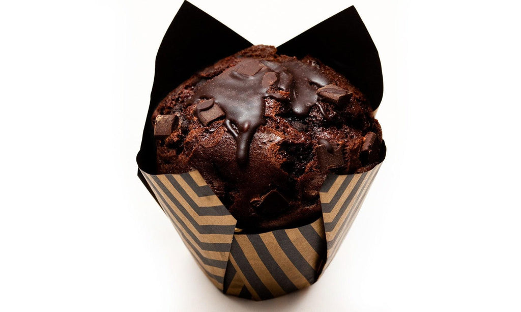 Triple chocolate Muffin with fudgy chocolate chips and chocolate chunks in a rich cocoa base.