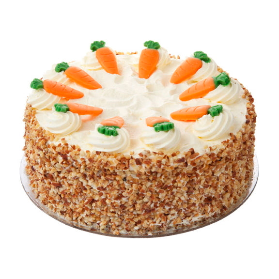 Mezzapica Traditional carrot sponge cake with a buttercream cheese frosting and finished on the sides with chopped nuts.