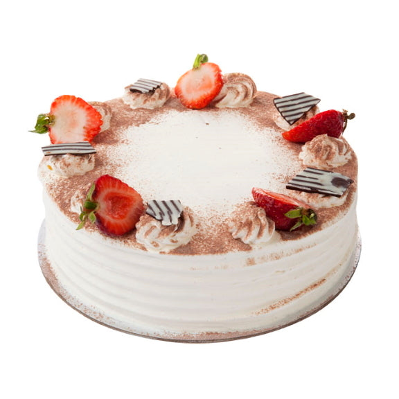Mezzapica Tiramisu cake made from Layers of mascarpone cream between chocolate and vanilla sponges moistened with coffee liqueur and finished with fresh strawberries