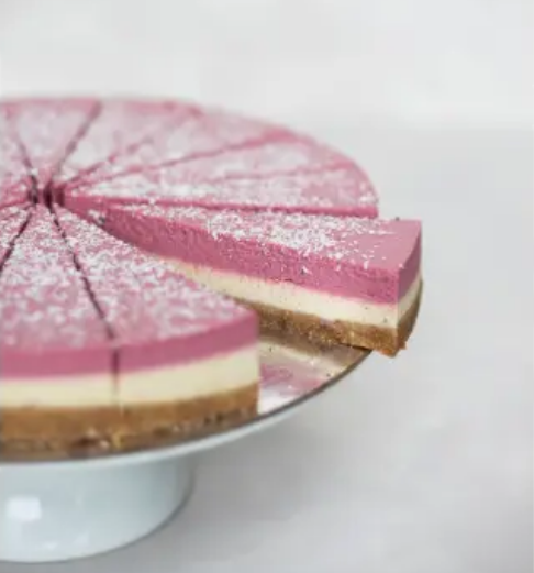 raw passion strawberries & cream vegan cake sliced
