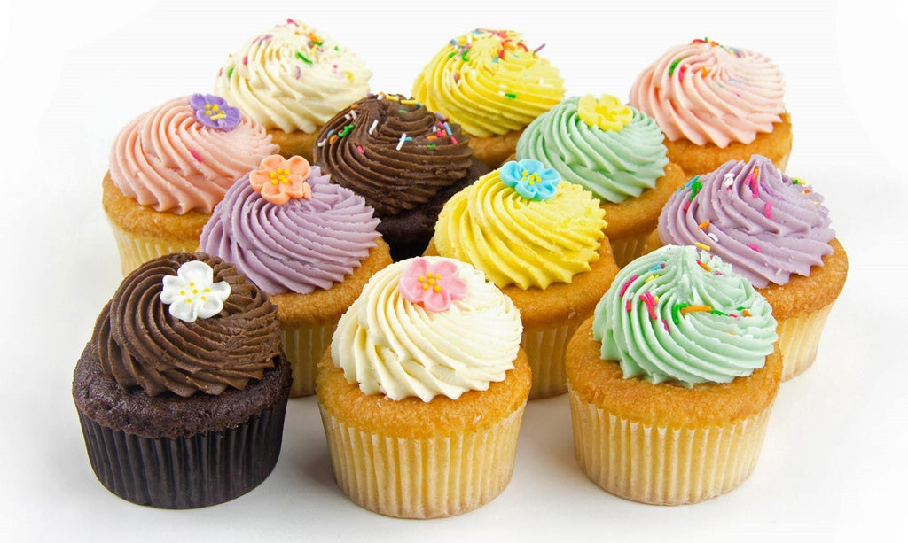 12 pretty-coloured Gluten Free cupcakes with flavours Pure Vanilla, Strawberry Swirl, Blue Vanilla, and Double Chocolate
