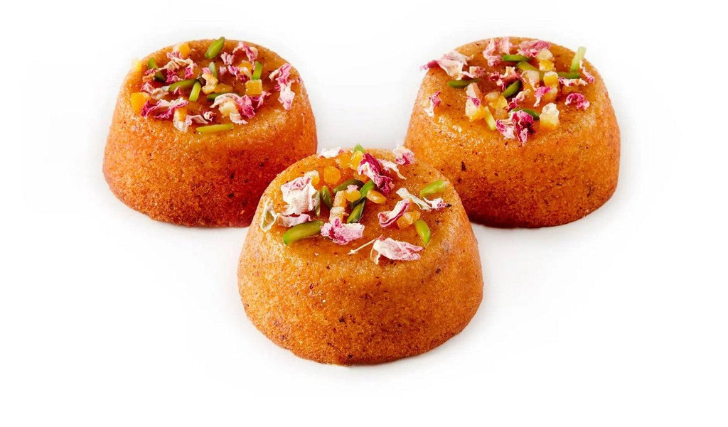 Gluten Free orange and almond cakes in a box of 6 and covered with colourful flowers