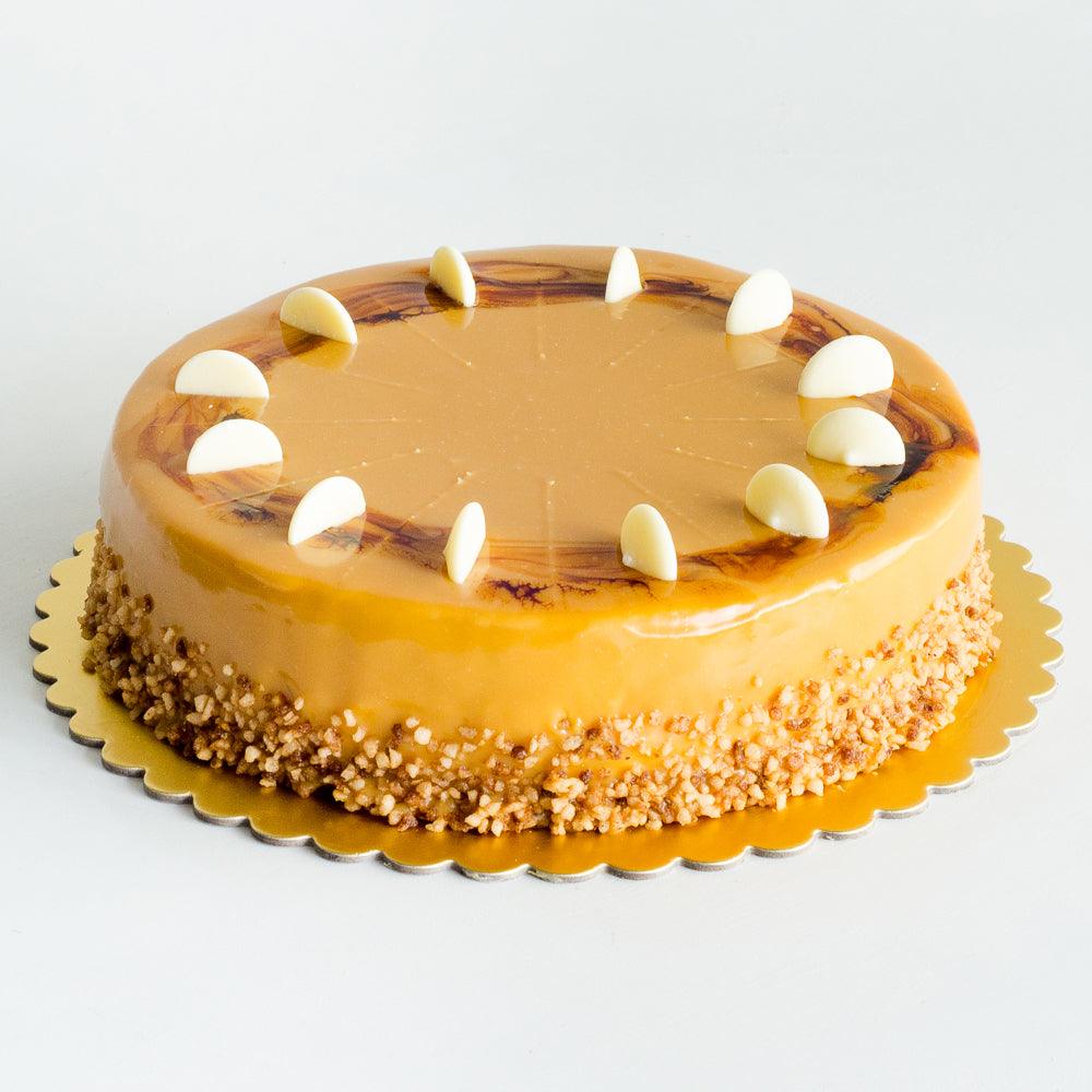 Pasticceria Papa’s delicious Caramel Mud Cake is made with caramel sponge and caramel ganache filling, finished with caramel ganache and crunch. 