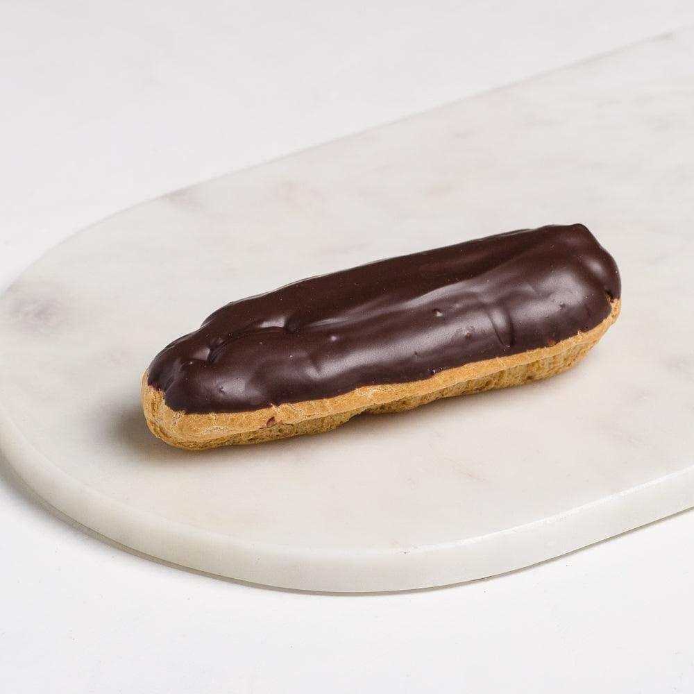 Papa's pasticceria chocolate eclair covered in chocolate and filled with cream