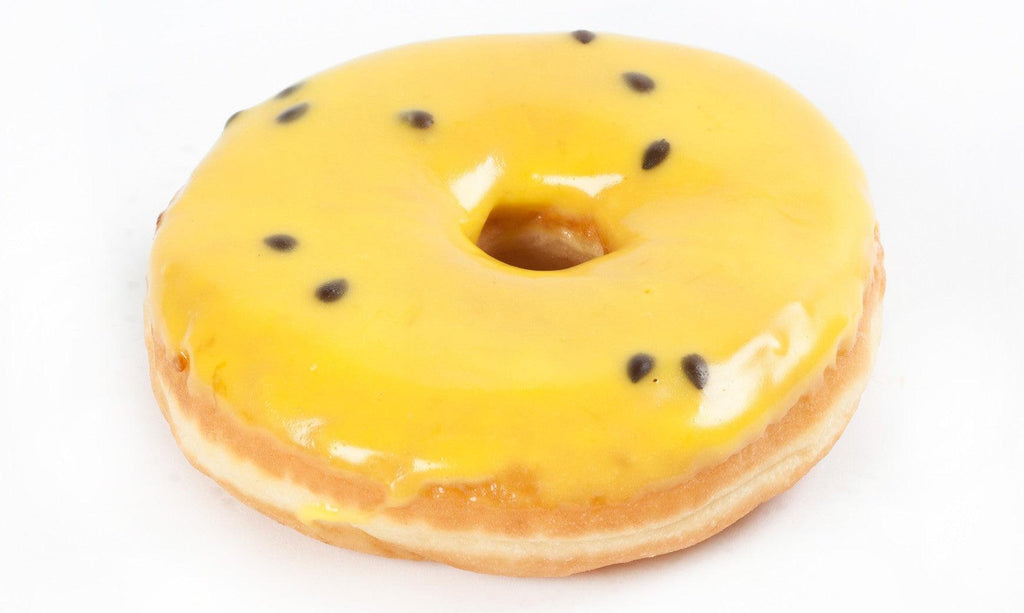 Large Round Passionfruit Donut Soft and fluffy ring donut with a passionfruit glaze.