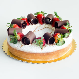 PAPA'S BAKED RICOTTA CHEESECAKE WITH CREAM, STRAWBERRIES AND CHOCOLATE SWIRLS
