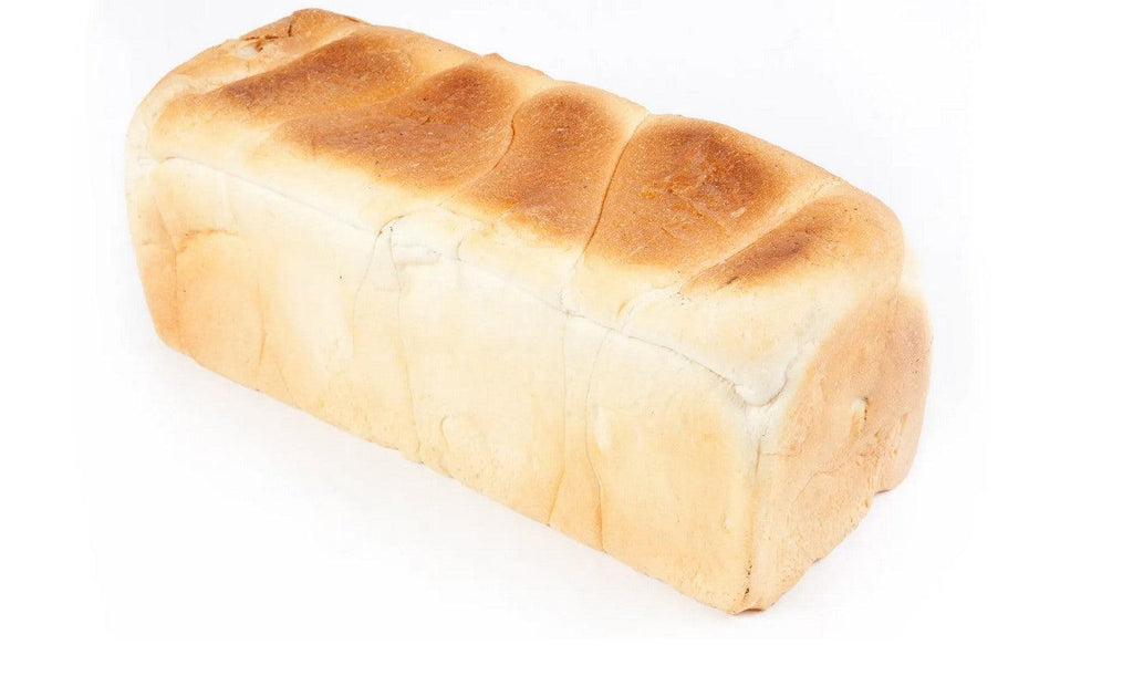 White whole bread loaf is soft and fluffy Unsliced